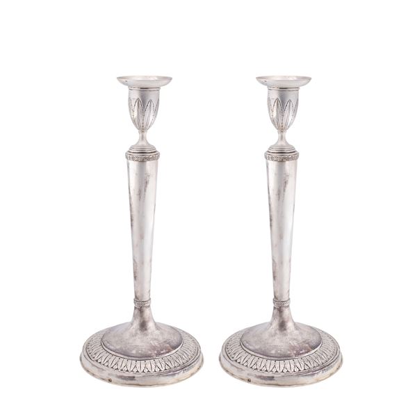 Pair of silver candlesticks