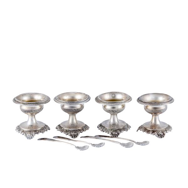 Four silver salt cellars