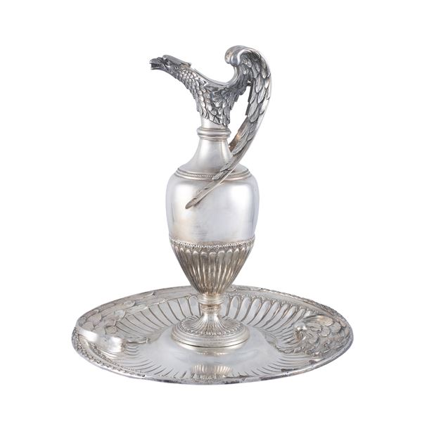 Silver pourer with circular tray