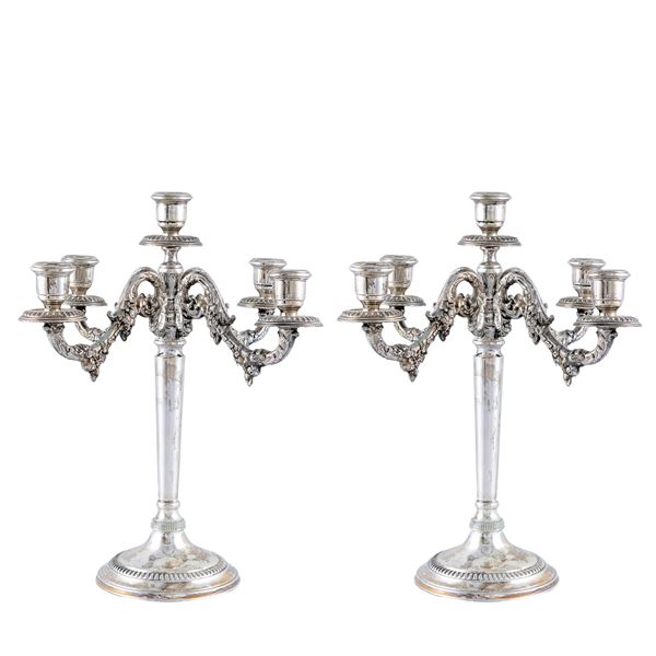 Pair of five-light silver candelabra