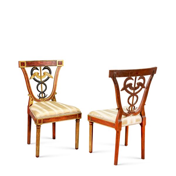 Eight lacquered and gilded wood chairs