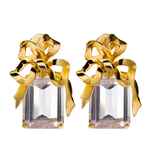 18kt yellow gold bow earrings with hanging amethysts