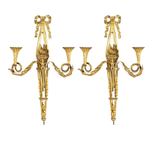 Pair of two-light appliques in gilt bronze