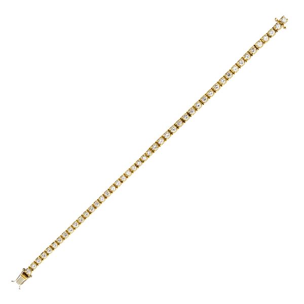 Bracciale tennis in oro giallo 14kt e diamanti