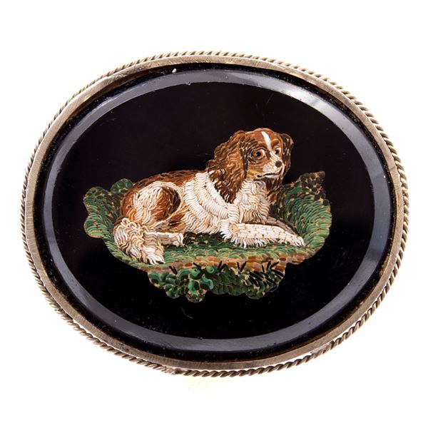 Oval micromosaic plaque mounted on a silver brooch