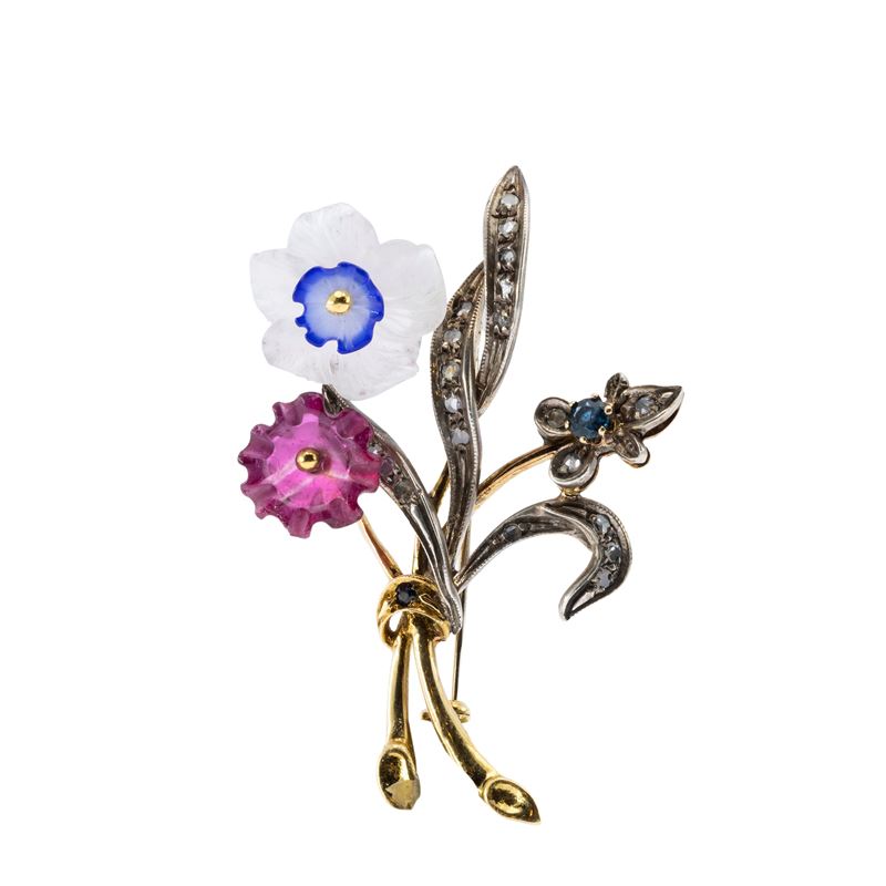 Spilla a motivo floreale in oro e argento