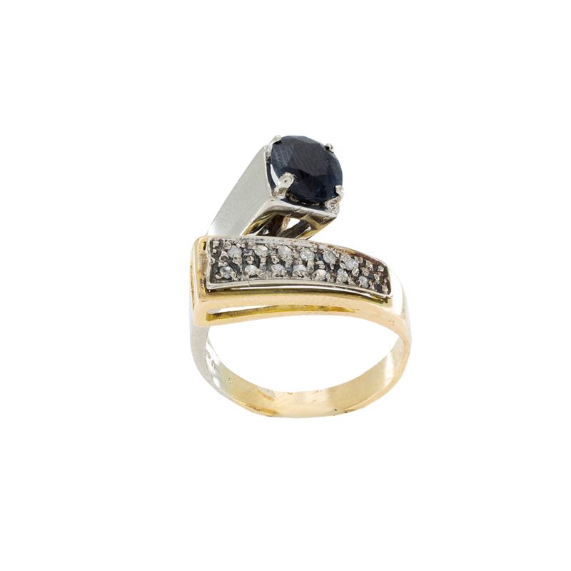 Anello contrariè in oro a due colori 18kt