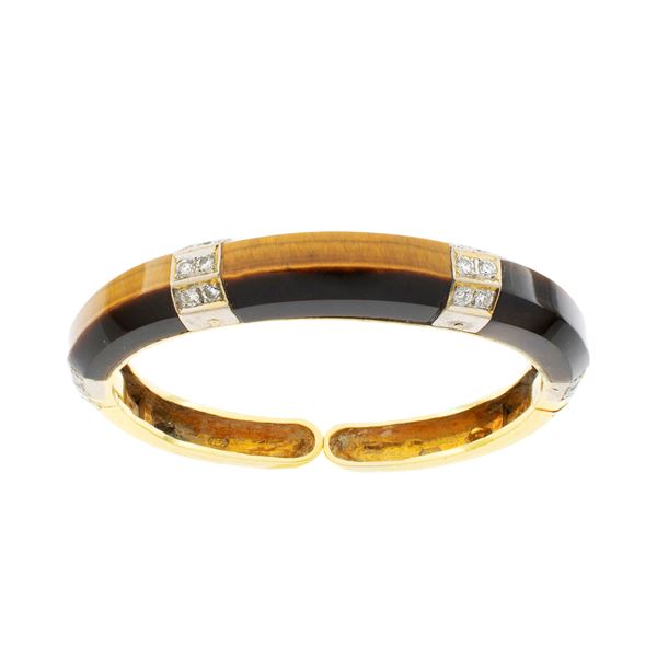 Bracciale a manetta in oro a due colori 18kt