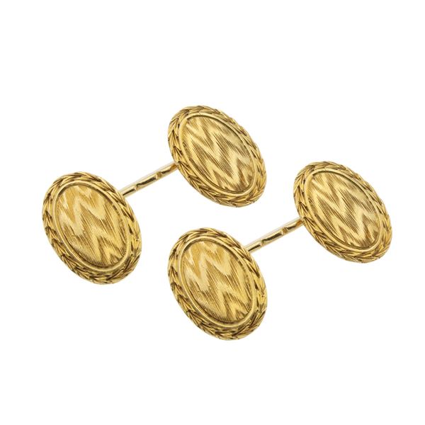 Gemelli ovali in oro giallo inciso 18kt  (anni 40/50)  - Asta Gioielli e Orologi - Colasanti Casa d'Aste