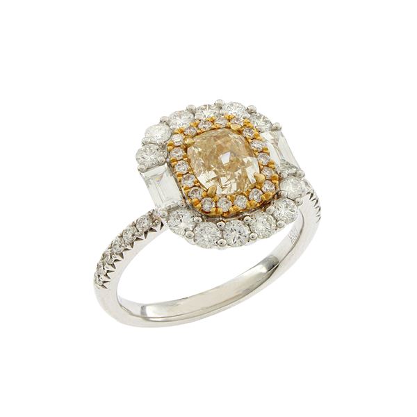 18kt white gold ring with a fancy yellow diamond