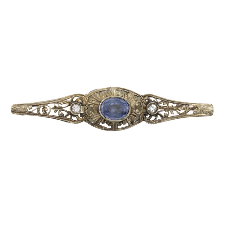 Antica spilla in oro e argento con zaffiro e due rose di diamante