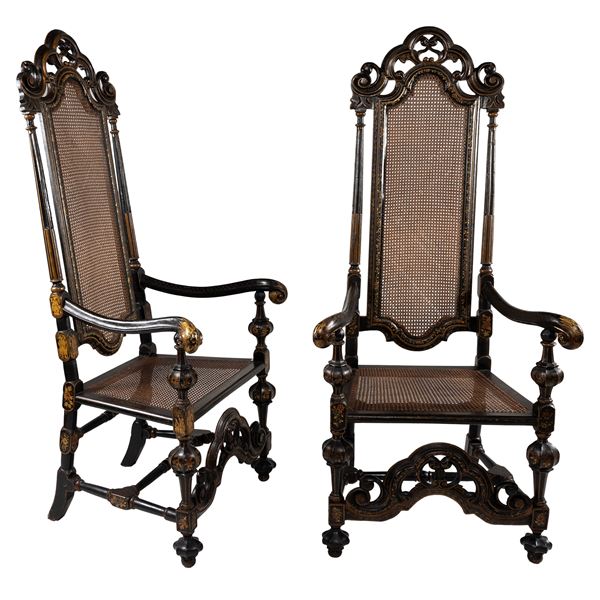 Pair of ebonized and lacquered wooden armchairs