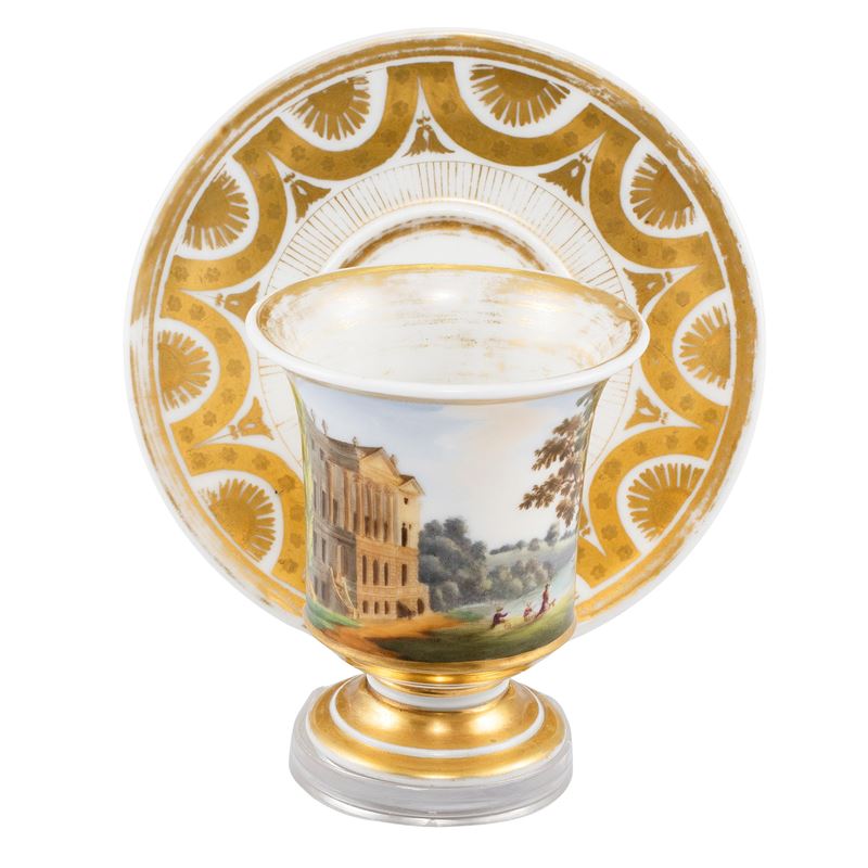 Tazza con piattino in porcellana policroma