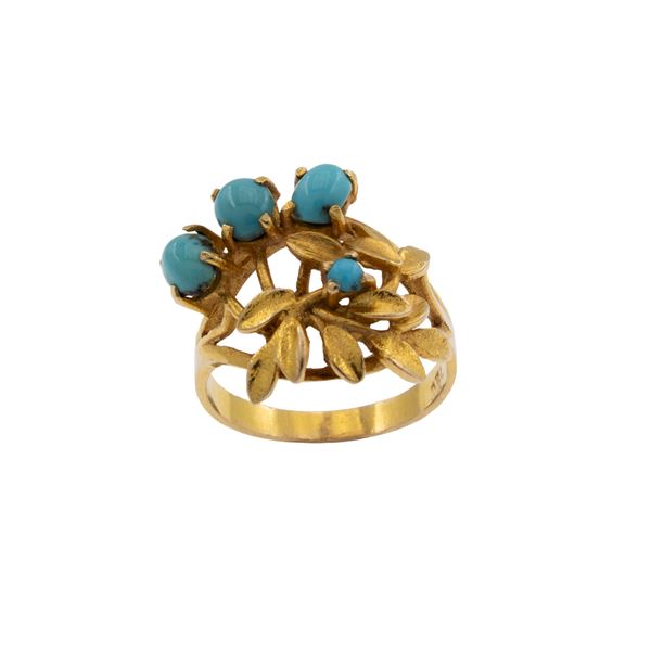 Anello in oro giallo 18kt e turchesi naturali