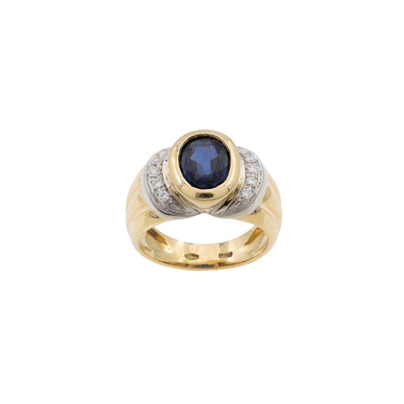 Anello in oro giallo e bianco 18kt