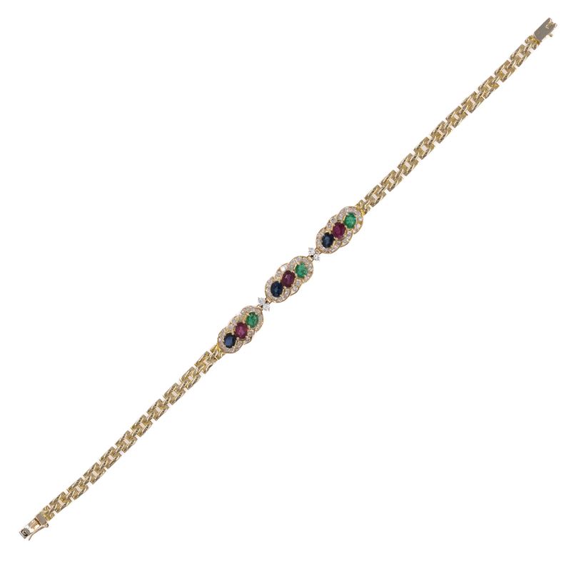 Bracciale in oro giallo 14kt rubini, zaffiri, smeraldi e diamanti