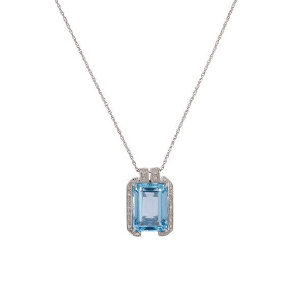 Pendente in oro bianco 18kt topazio azzurro e diamanti