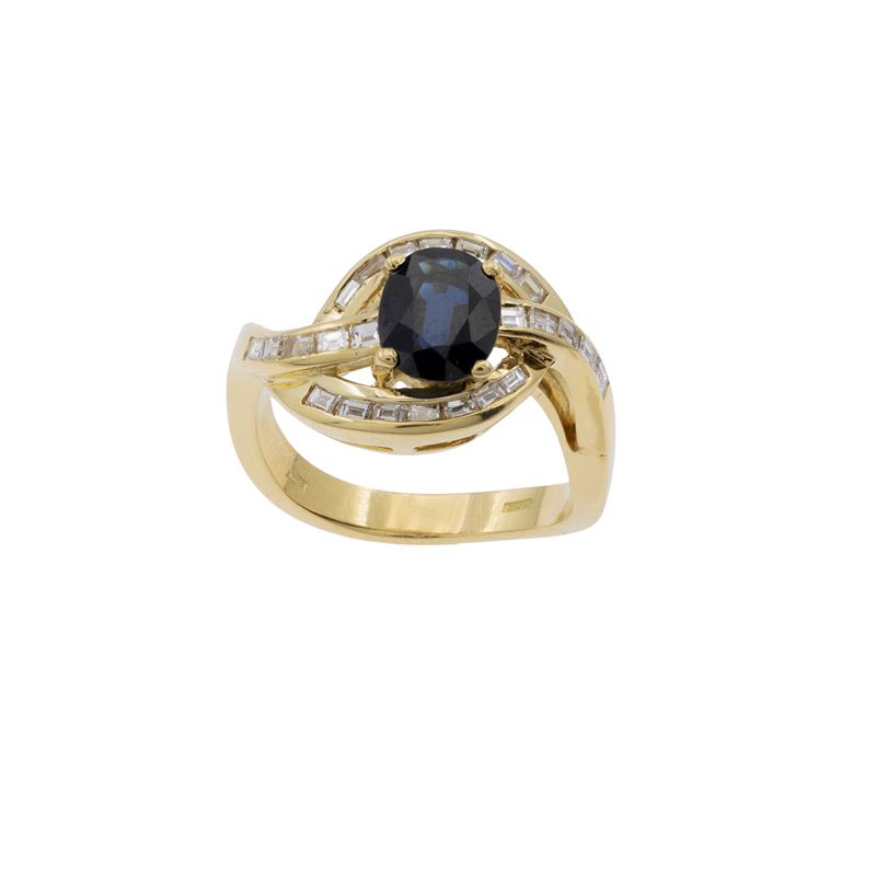 Anello in oro giallo 18kt zaffiro e diamanti