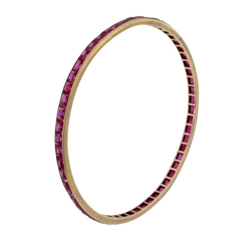 Bracciale a manetta in oro giallo 18kt e rubini