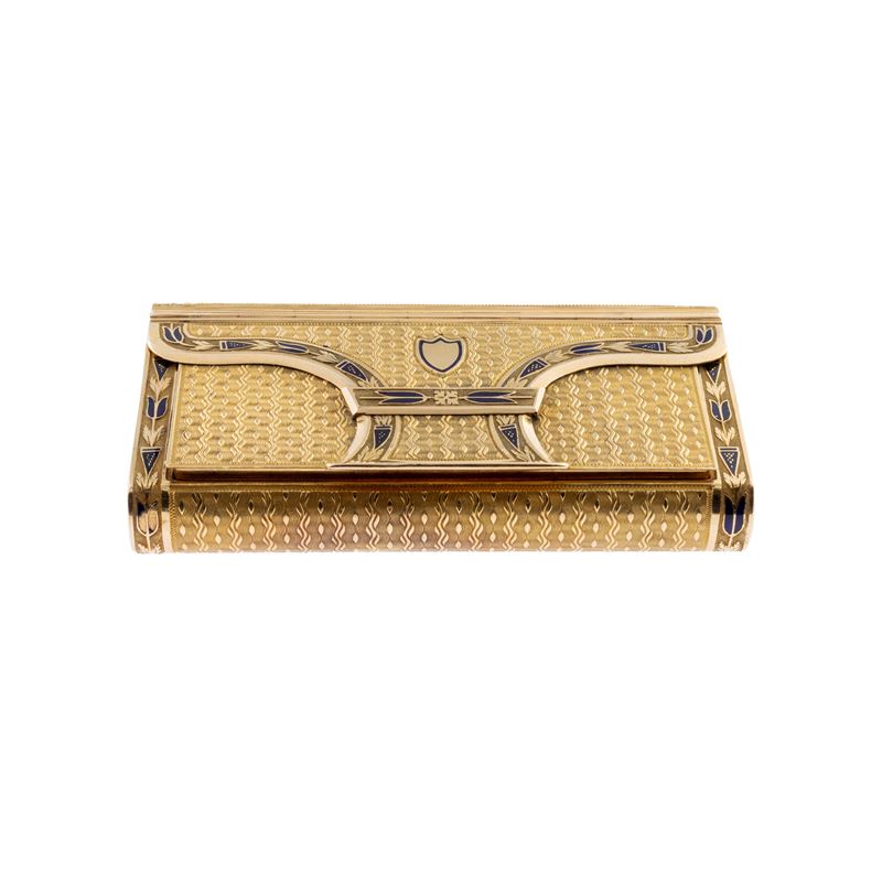 Piccola trousse in oro giallo 18kt e smalto blu