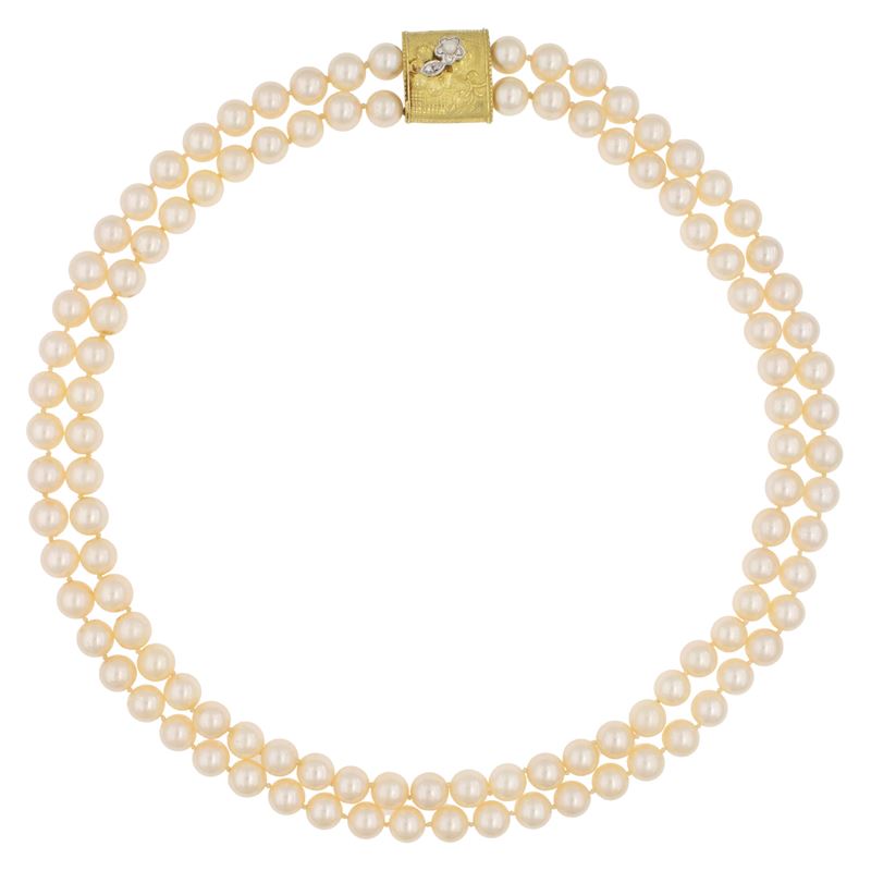 Collana a due fili di perle coltivate con chiusura in oro giallo e bianco 18kt