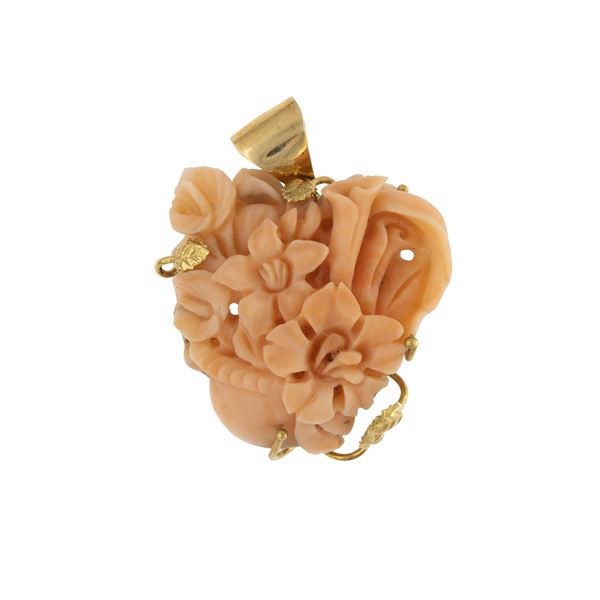 Coral pendant with floral motif