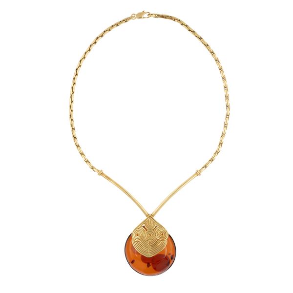 Collana in oro giallo 18kt e ambra naturale
