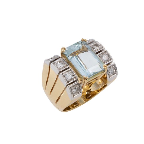 Anello in oro a due colori 18kt con acquamarina