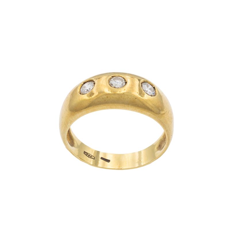 Anello in oro giallo 18kt e tre diamanti