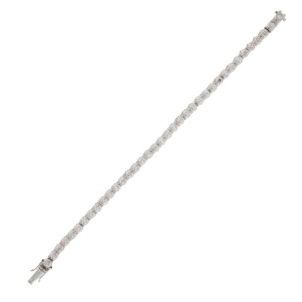 Bracciale tennis in oro bianco 18kt e diamanti