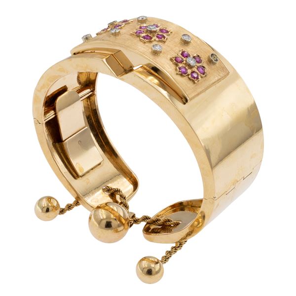 Bracciale a manetta in oro giallo liscio e satinato 18kt