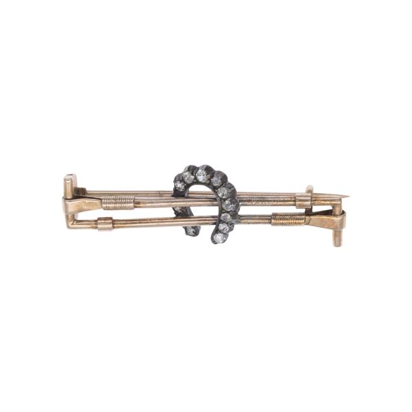Antique horseshoe brooch in silver, gold and roses coroné