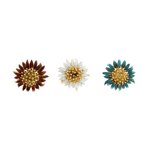 Three coverbutton pins with floral motif