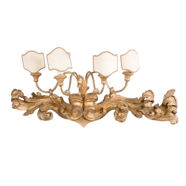 Four lights electrified frieze in gilt and carved wood