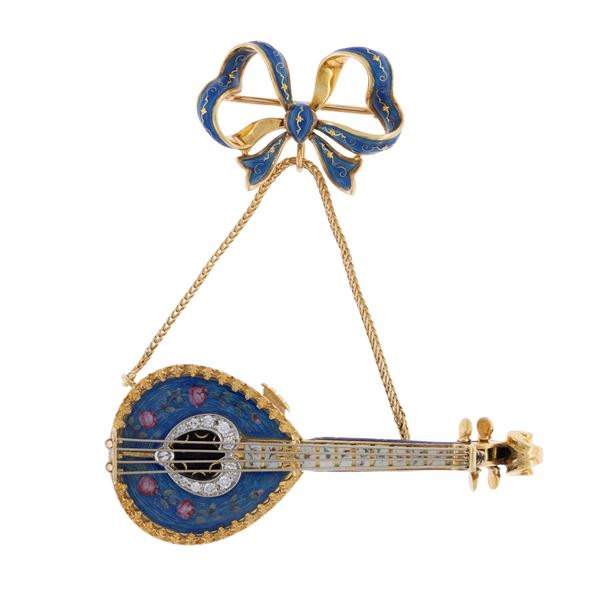 Ribbon shaped brooch with mandolin pendant