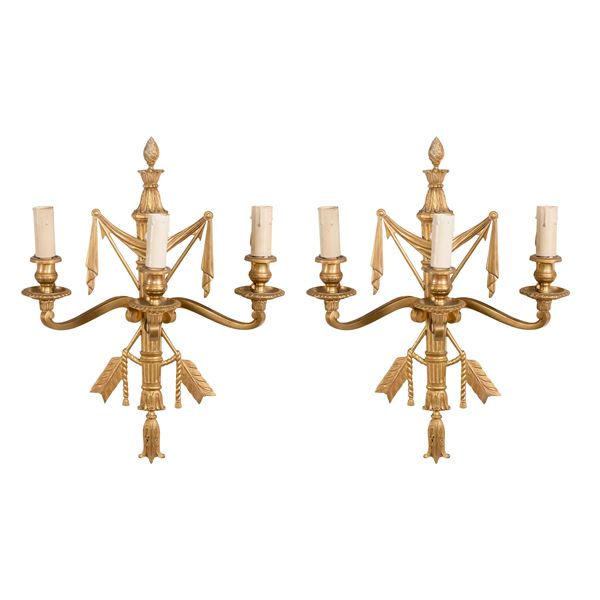 Coppia di appliques in bronzo dorato a tre luci