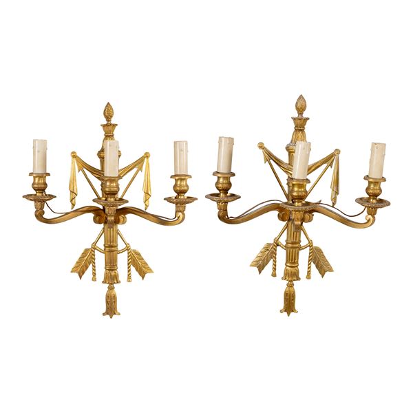 Coppia di appliques in bronzo dorato a tre luci