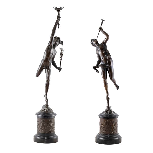 Coppia di sculture in bronzo patinato e marmo
