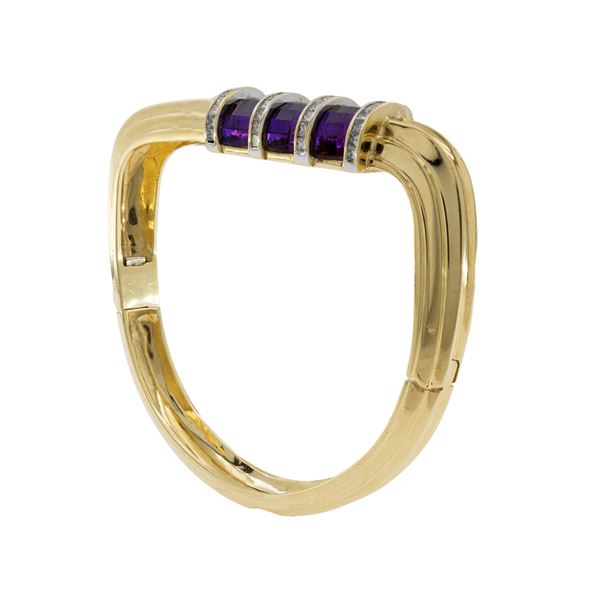 Bracciale a manetta in oro giallo 18kt