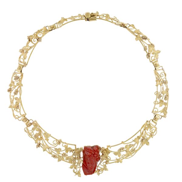 Collana in oro giallo 18kt lavorato a tralci di vite