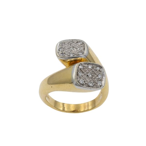 Anello contrarié in oro a due colori 18kt e diamanti