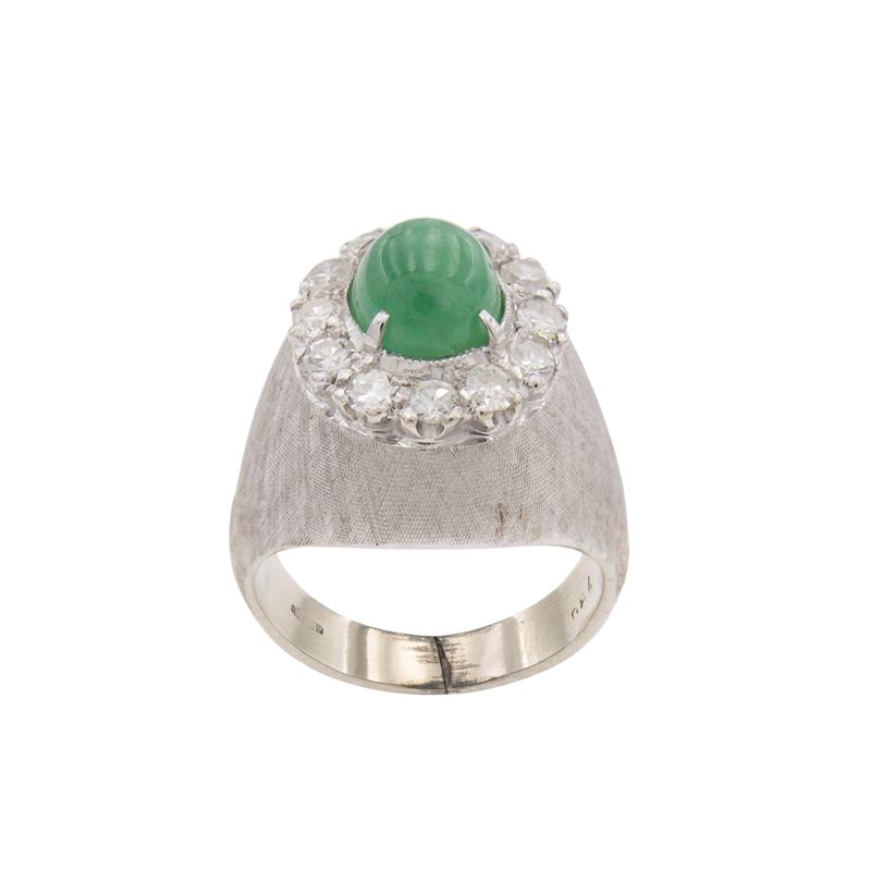 Anello in oro bianco satinato 18kt smeraldo e diamanti