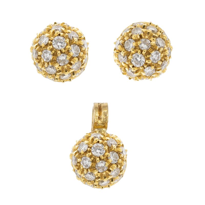 Orecchini e pendente a sfera in oro giallo 18kt e diamanti