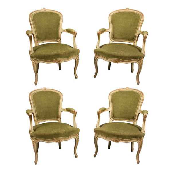 Four carved, green lacquered and golden lacquered wood armchairs