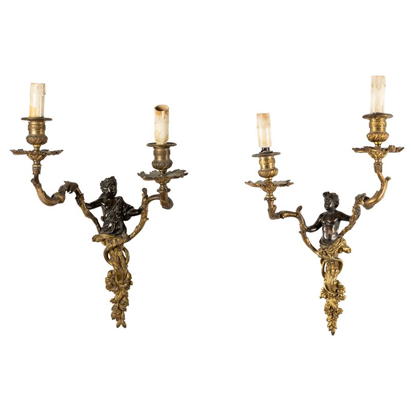 Coppia di appliques in bronzo patinato e dorato