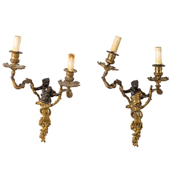 Coppia di appliques in bronzo patinato e dorato