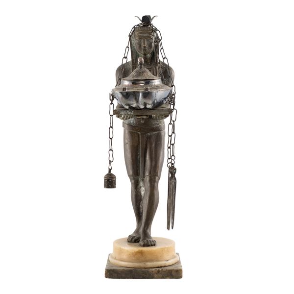 Patinated bronze and silver oil lamp on a marble base