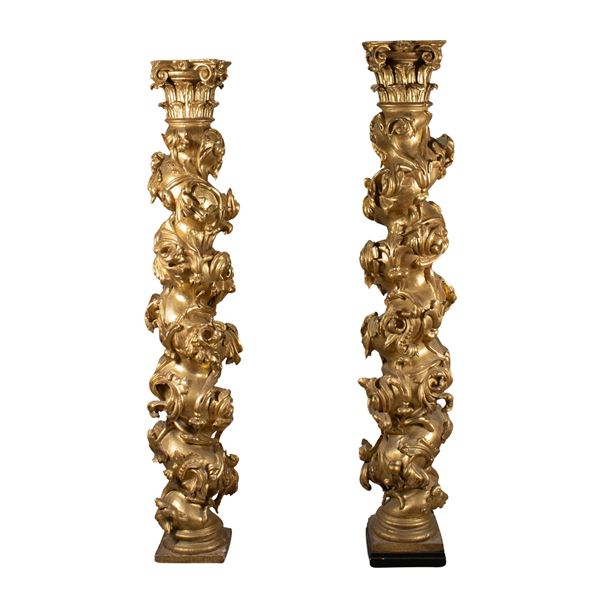 Pair of carved, golden and lacquered wood columns