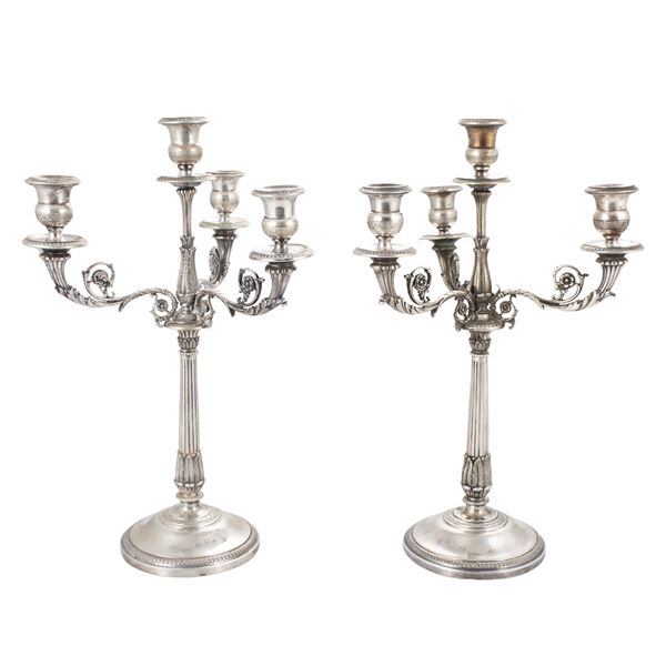 Coppia di candelabri in argento a quattro luci