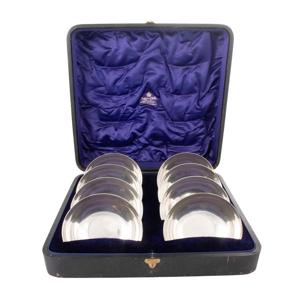 Set of eight silvered metal cups